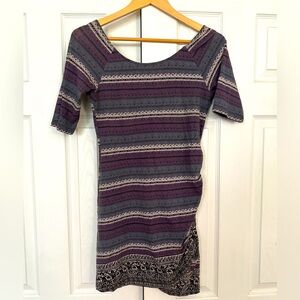 Free People bodycon dress w/ three-quarter sleeves & stripe pattern .  Size M.